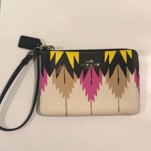 Pink, Yellow, beige and Black coach wristlet